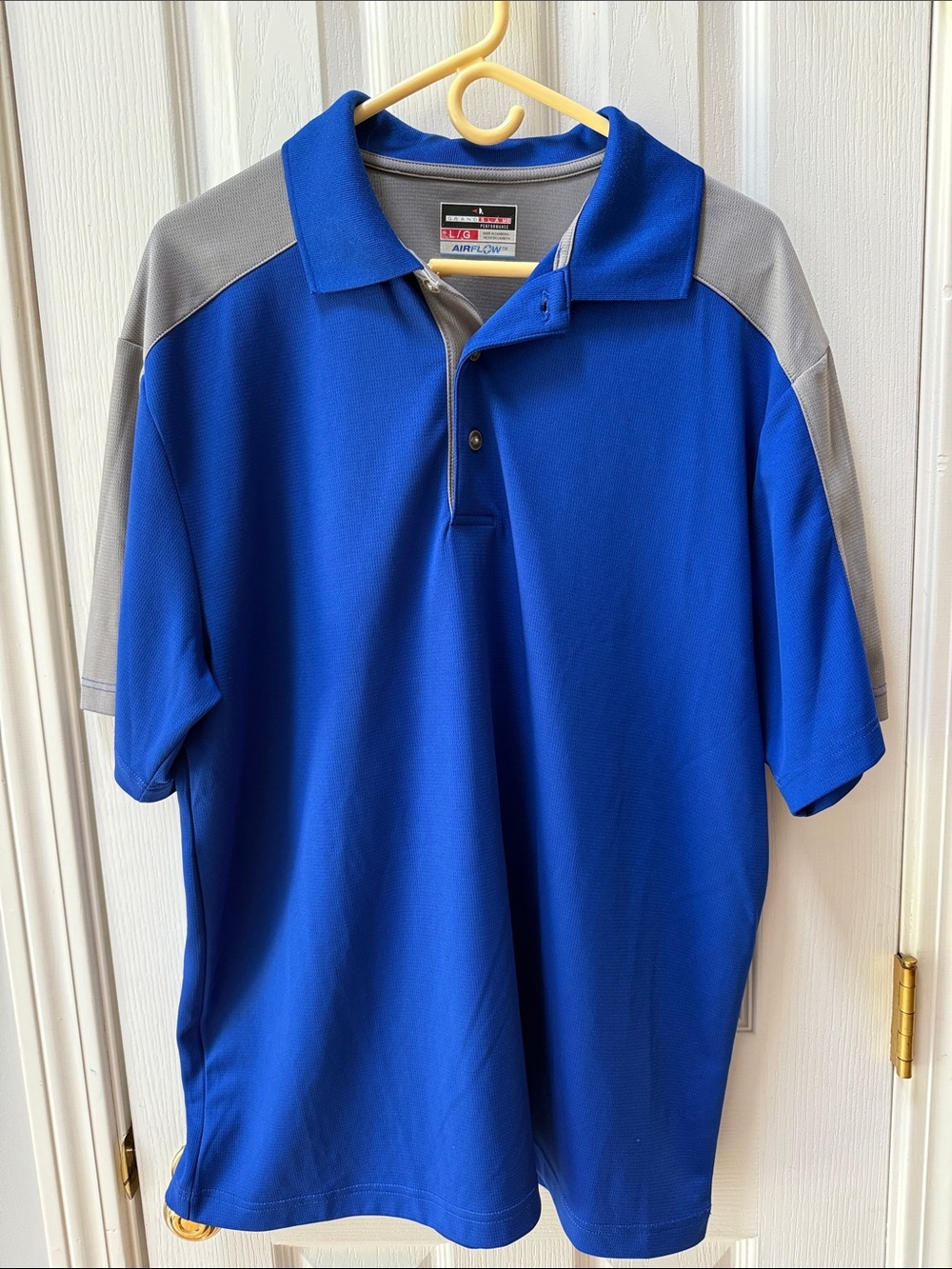 Men’s Grand Slam Blue Polo with Gray Shoulder Panels